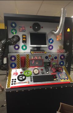 an electronic device with many different types of buttons and knobs on the display case