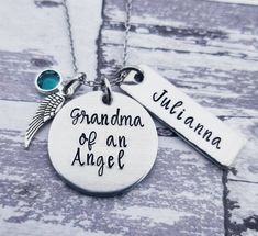 "This necklace is a special keepsake for a Grandmother who has experienced the loss of a grandchild. I have hand stamped, one letter, one hammer strike at a time, \"Grandma of an Angel\" onto a hypoallergenic aluminum disc and added an angel wing charm, a swarovski birthstone crystal, and a personalized name tag. The round 1\" pendant is made of lightweight hypoallergenic grade aluminum that will not tarnish. The charms adorn a dainty sterling silver plated chain with a lobster clasp. **Upon ord Meaningful Birthstone Necklace For Anniversary, Spiritual Hand Stamped Necklaces For Personalized Gift, Personalized Silver Charm Necklace For Memorial, Sterling Silver Birthstone Necklace For Memorial, Personalized Spiritual Birthstone Necklace For Gift, Personalized Spiritual Birthstone Necklace As Gift, Hand Stamped Round Memorial Jewelry, Personalized Birthstone Necklace For Mother's Day Keepsake, Memorial Birthstone Necklaces