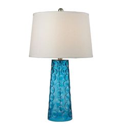 a blue table lamp with a white shade