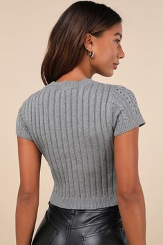 Your autumn style will be truly special with a trendy must-have like the Lulus Modish Ways Heather Grey Cable Knit Short Sleeve Sweater Top! This soft and stretchy sweater (with a subtle heathered effect throughout) boasts a variety of classic designs, including cable, seed, and ribbed knit textures (plus pierced detailing), that makes this piece truly unique. A timeless crew neckline and a fitted, cropped bodice are framed by cute short sleeves, while contrasting ribbed knit trim at the necklin Knit Short, Short Sleeve Sweater, Autumn Style, Knit Shorts, Short Sleeved Sweaters, Cable Knit Sweater, Cute Shorts, Sleeve Sweater, Custom Fit