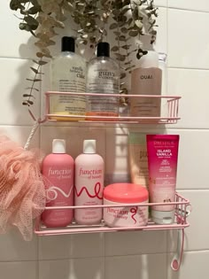 a bathroom shelf with several different types of hair products on it