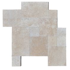 a white tile wall with several different shapes and sizes, including one in the shape of a rectangle