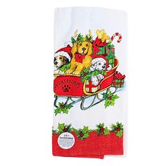 a kitchen towel with dogs riding in a sleigh and presents on the front