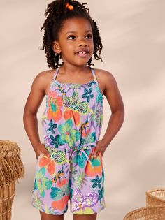 Our in-house artists designed this exclusive print inspired by their recent trip to Kenya. Looks like such a cute dress, but look again! This Tea favorite is a summer-ready romper that allows your kiddo such freedom to play. A smocked bodice adds even more style and comfort. Crafted from 100% soft cotton jersey that keeps its color. Decorative waist tie on the elastic waist. Slash pockets. Thigh length. Casual Floral Print Bubble Romper For Playtime, Summer Floral Print Bubble Romper For Playtime, Summer Bubble Romper With Floral Print, Summer Bubble Romper For Spring Playdate, Summer Bubble Romper For Playdate In Spring, Casual Bubble Romper With Floral Print For Spring, Playful Floral Print Jumpsuits And Rompers For Spring, Casual Floral Print Bubble Romper For Spring, Sleeveless Summer Bubble Romper With Floral Print