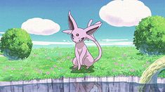 a pink pokemon sitting on top of a grass covered field next to a lake and trees