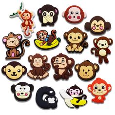 a bunch of monkey magnets sitting next to each other