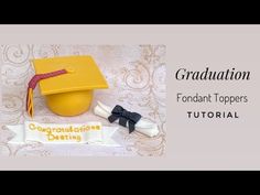 graduation cake for fondant toppers with mortar cap and candy bar wrapper on it