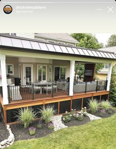 a small house with a deck and patio