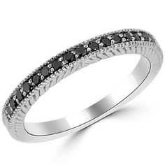 a white gold ring with black diamonds