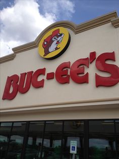 a buc - ee's storefront with the sign above it that says buc - ee's