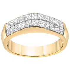 This elegant ring features two rows of princess cut diamonds invisible set in an 18K yellow gold setting. The domed triangular center makes this ring stand out from the rest. Ring size 6.25