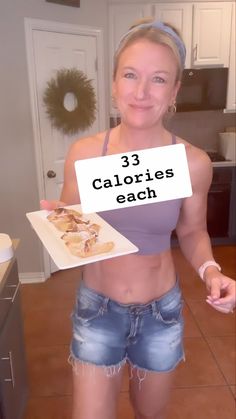 a woman holding up a sign with the words 3 calories each in front of her