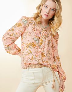 Tucked in or flowing over our Howell Wide Leg Crop Jean, our viscose Joslynn Square Neck Blouse flourishes in floral vines. On-trend for this season, the top boasts soft puff sleeves and a square neckline. Long Sleeve Rayon Peasant Top With Floral Print, Casual Boho Print Rayon Tops, Casual Rayon Tops With Boho Print, Vacation Floral Print Viscose Blouse, Spring Bohemian Rayon Tops, Feminine Rayon Tops For Fall, Vacation Rayon Blouse With Floral Print, Floral Print Viscose Blouse For Vacation, Floral Print Rayon Blouse For Vacation