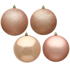 three gold and two white christmas ornaments