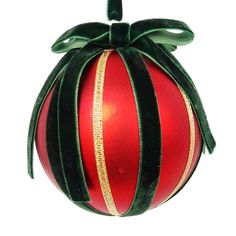 a red and black striped ornament hanging from a green ribbon