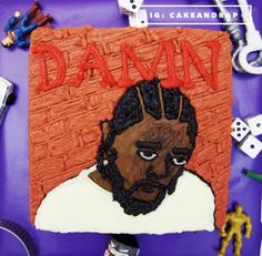 a cake that has been decorated to look like a man's face with the word damn on it