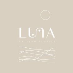 the logo for lunaa artisan textiles, which has been designed to look like waves