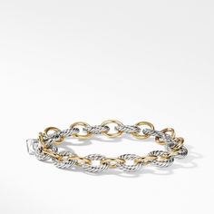 This bracelet is made from a combination of sterling silver and 18k yellow gold, and is part of the Chain collection. David Yurman Chain, Mixed Metal Bracelet, David Yurman Bracelet, Link Chain Bracelet, David Yurman Jewelry, Metal Bracelet, Yellow Gold Bracelet, Gold Collection, Metal Bracelets