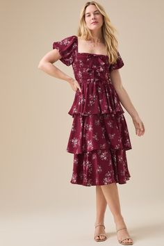 Perfect for a special occasion or a day out, this floral tiered maxi dress offers both comfort and style. The smocked bodice ensures a comfortable fit, while the bow details add an elegant touch. Tiered Maxi Dress, Altar'd State, Floral Midi Dress, Dress Romper, Dress With Bow, Fit & Flare, Homecoming Dresses, New Dress, Bodice