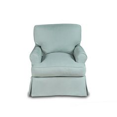 a light blue chair with a footstool