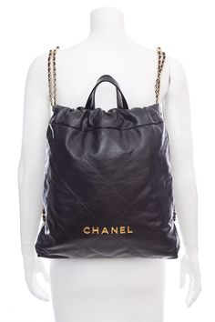 Chanel 22 2023 Black Calf-skin Leather Backpack with Gold Hardware. This item is in like new condition.Length: 14"Depth: 3"Height: 15.25" Brand = Chanel Color = Black Condition = Like New Item Number: 5412-88 Item ID: 179186 Category: Backpack High-end Black Backpack, Luxury Backpack With Removable Pouch, High-end Black Backpack Shoulder Bag, Luxury Tote Backpack For Shopping, Designer Leather Backpack With Removable Pouch For On-the-go, Designer Leather Backpack For Shopping, Luxury Black Backpack With Detachable Strap, Luxury Leather Backpack With Leather Backing For On-the-go, Luxury Leather Backpack For Shopping