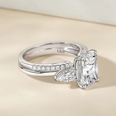 an engagement ring set with a princess cut diamond