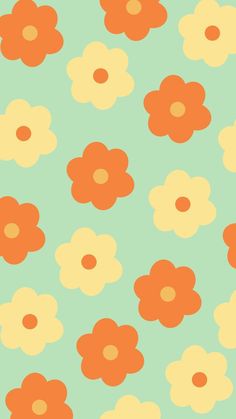 an orange and yellow flower pattern on a green background