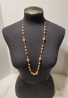 Banana Republic Beaded Necklace - Excellent Condition - coral colored beads - signed - see pictures for more details Orange Necklaces With Large Beads For Party, Orange Party Necklaces With Large Beads, Orange Polished Beads Necklace, Vintage Orange Beaded Chain Necklace, Vintage Orange Beaded Necklace, Orange Costume Jewelry Necklace For Party, Orange Beaded Long Necklace, Elegant Orange Beaded Chain Necklace, Elegant Orange Beaded Chain