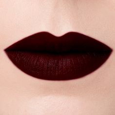 Fortune Teller: A dark berry red lipstick with a lacquer-like depth.