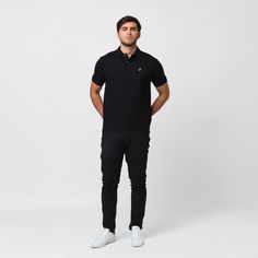 Our versatile classic polos are made with 100% Pima cotton. They are perfect as an office attire or leisurewear providing you a sophisticated look. Made in Peru100% Pima CottonGold Embroidered James Bark LogoRibbed Finishes Formal Black Cotton Top, Classic Fitted Polo Shirt For Workwear, Modern Fitted Polo Shirt For Business Casual, Elegant Polo Shirt For Work, Black Fitted Cotton Polo Shirt, Fitted Black Cotton Polo Shirt, Fitted Short Sleeve Polo Shirt For Business, Black Cotton Business Tops, Elegant Cotton Polo Shirt For Business Casual