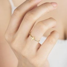 The perfect everyday ring to complete your outfit! Its minimalistic, sleek design is all the rage and perfect for mixing and matching with other on-trend rings. Metal: 14k yellow / white / rose gold Cross: 6.0mm x 4.5mm / 0.23" x 0.17" Band width: 1.4 mm / 0.055" Trend Rings, Gold Cross Ring, Cross Accessories, Delicate Silver Rings, Purity Ring, Rings Metal, Everyday Ring, Classy Jewelry, Cross Ring