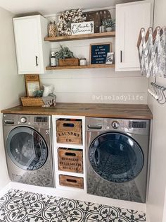 a washer and dryer in a laundry room with shelves above the washer