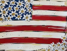 an american flag with daisies painted on it