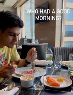 a man sitting at a table eating food with the words who had a good morning?