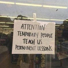 a sign posted in the window of a store stating it is temporary people teach us permanent lessons