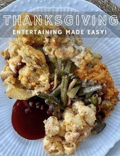 a white plate topped with stuffing and vegetables