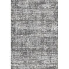 an area rug with grey and white colors