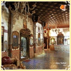 an ornately decorated room with chandeliers and mirrors