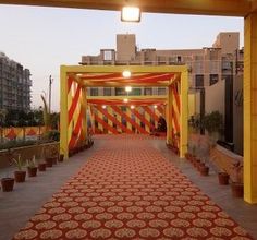 the walkway is decorated with red and yellow stripes