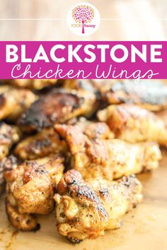 chicken wings on a cutting board with the words blackstone chicken wings over it's image