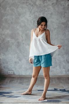 Perfect for the summer, this breathable, free-flowing linen cami is the ideal wardrobe staple for the warm months and long evenings. This strapless white blouse is modestly lined in the chest with a loose, flowy hem. Perfect to wear for a picnic in the park or on a cocktail date with your girls!Made from washed linen, this strappy top is not only durable but gets softer after every wash! ***The Prancing Hare is the sister brand of Bunny Street, which was launched by Irene Sheyko in 2013. Drawing Sleeveless Linen Camisole For Beach, Spring Linen Summer Camisole, Sleeveless Linen Camisole For Vacation, Spring Linen Camisole, White Linen Sleeveless Camisole, Summer Linen V-neck Camisole, Linen Camisole Top For Beach, Summer Linen Sleeveless Camisole, Linen Cami Camisole For Vacation