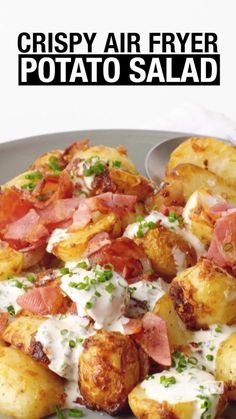 crispy air fryer potato salad on a plate with bacon and ranch dressing in the middle