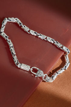 Embrace a symbol of tranquility with this pure silver bracelet, handcrafted for both women and men. Its unique peace pattern is fashioned for the trend-savvy individual, a fine jewelry gift that offers more than style; it signifies serenity. Ideal for gifting, or as your personal emblem of peace. Traditional Silver Chain Bracelets Gift, Spiritual Sterling Silver Bracelets With Silver Clasp, Engraved Silver Spiritual Chain Bracelet, Spiritual Engraved Silver Chain Bracelet, Traditional Chain Bracelet With Sterling Silver Clasp As Gift, Spiritual Sterling Silver Engraved Chain Bracelet, Silver Bangle For Meditation, Symbolic Bracelet With Sterling Silver Clasp For Gift, Spiritual Chain Bracelet With Sterling Silver Clasp