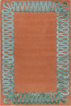 an orange rug with blue trimmings on the edges and a square shaped border