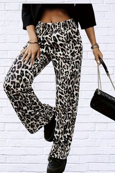 Unleash your wild side with our Full Size Animal Print Elastic Waist Pants. These pants offer a comfortable fit with an elastic waistband and a playful, eye-catching print. Perfect for adding a touch of fun to your wardrobe. Material composition: 100% Polyester Care instructions: Machine wash cold. Tumble dry low. Imported Size US Bottom Length Waist Hip S 2/4 39 25.2 0 M 6 39.4 26.8 0 L 8 39.8 28.3 0 XL 10 40.2 29.9 0 2XL 12 40.6 31.5 0 3XL 14 40.9 33.1 0 Non-stretch Casual Printed Pants, Trendy Non-stretch Leopard Print Pants, Trendy Printed Bottoms With Relaxed Fit, Trendy Relaxed Fit Printed Bottoms, Trendy Leopard Print Summer Pants, Casual Full-length Printed Pants, Casual Full Length Printed Pants, Leopard Print Loungewear Bottoms, Leopard Print Long Pants For Loungewear