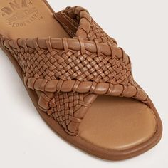 The hottest trend this season is woven sandals. DNA Footwear has you covered with the Woodruff sandal. Handwoven leather styled as a simple slide gives you the look of the season. Pair them with a floral print dress for a truly tropical outfit. You are going to LOVE these. Genuine leather uppers Woven leather straps Padded footbed for comfort Soft rubber outsoles STYLENAME: WOODRUFF-COG Brown Woven Sole Sandals For Summer, Brown Flat Woven Sandals, Brown Woven Flat Sandals, Brown Woven Open Toe Sandals, Brown Open Toe Woven Sandals, Brown Sandals With Intrecciato Weave For Spring, Woven Leather Sandals For Vacation, Spring Leather Mules With Woven Sole, Spring Leather Sandals With Woven Sole