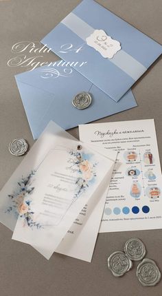 the wedding stationery is laid out and ready to be put into their guests'envelopes