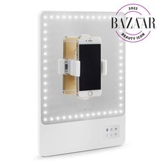 an iphone charging station is shown in front of a white background with the words bazaar above it