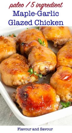 baked maple - garlic glazed chicken in a white casserole dish with text overlay