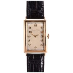 Vintage Swiss IWC rare mens Art Deco wrist watch, circa 1939. This watch features an 18 karat yellow gold case with an Art Deco dial, Breguet Arabic numerals, and restored original dial by the International Watch Company. The watch is marked Schaffhausen and has a rare highest grade hand made 19 jewel movement #679171, case #34661, calibration 10-1/2. Dimensions Case: 43mm H (lug tip to lug tip) x 25mm W (excluding crown) x 8mm D Warranty This watch comes with a full 18 month warranty from the date of purchase. Classic Collectible Watch With Rectangular Dial, Classic Watches With Rectangular Dial For Collectors, Antique Formal Watches With Subdials, Antique Formal Analog Watch, Antique Analog Watch For Formal Occasions, Classic Jewelry And Watches With Rectangular Dial, Art Deco Formal Rectangular Watch, Formal Art Deco Rectangular Watch, Classic Collectible Watches With Diamond Hour Markers